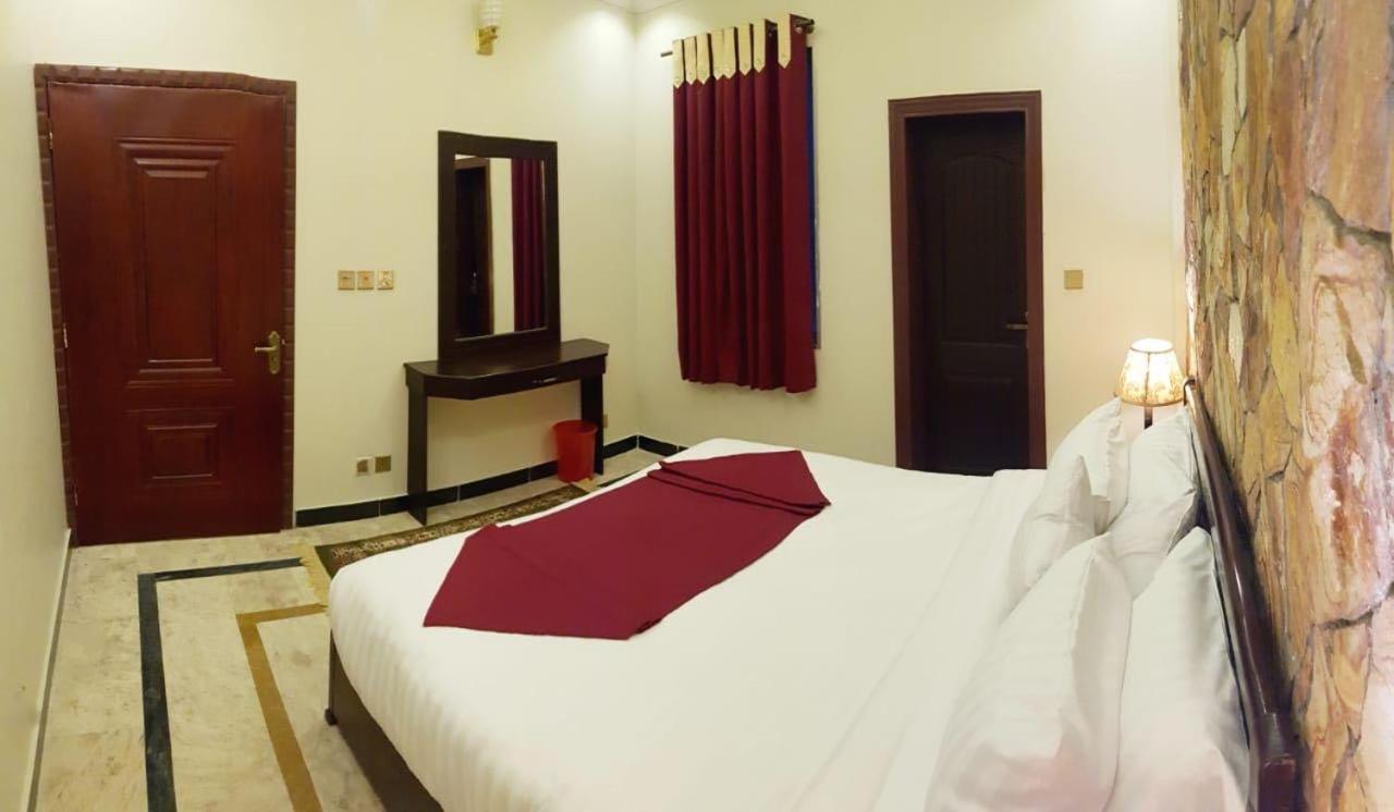 Triple One Hotel Suites Абботтабад Экстерьер фото