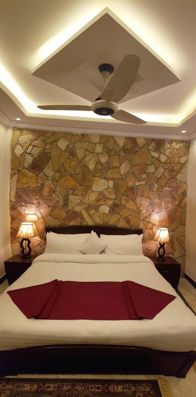 Triple One Hotel Suites Абботтабад Экстерьер фото