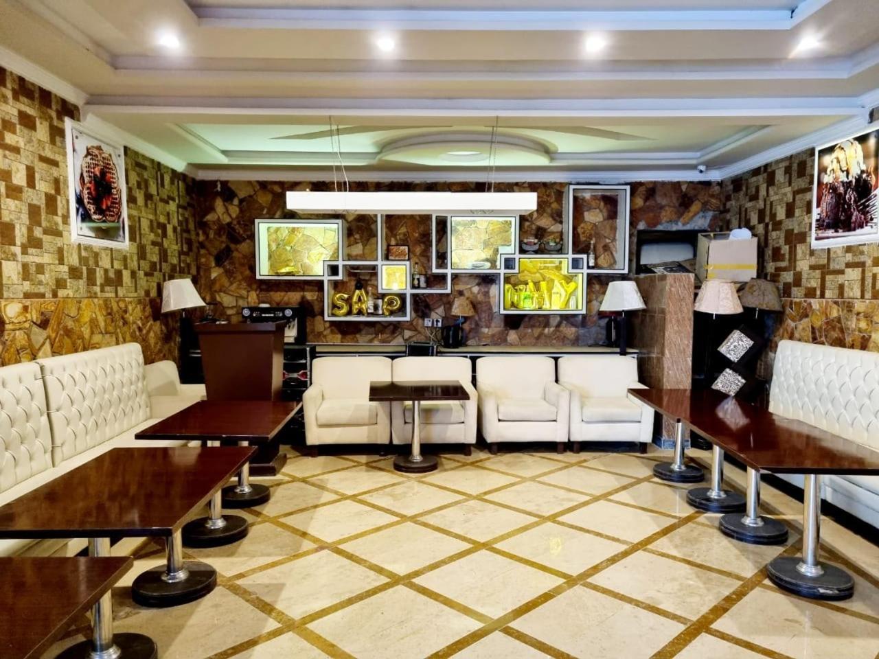 Triple One Hotel Suites Абботтабад Экстерьер фото
