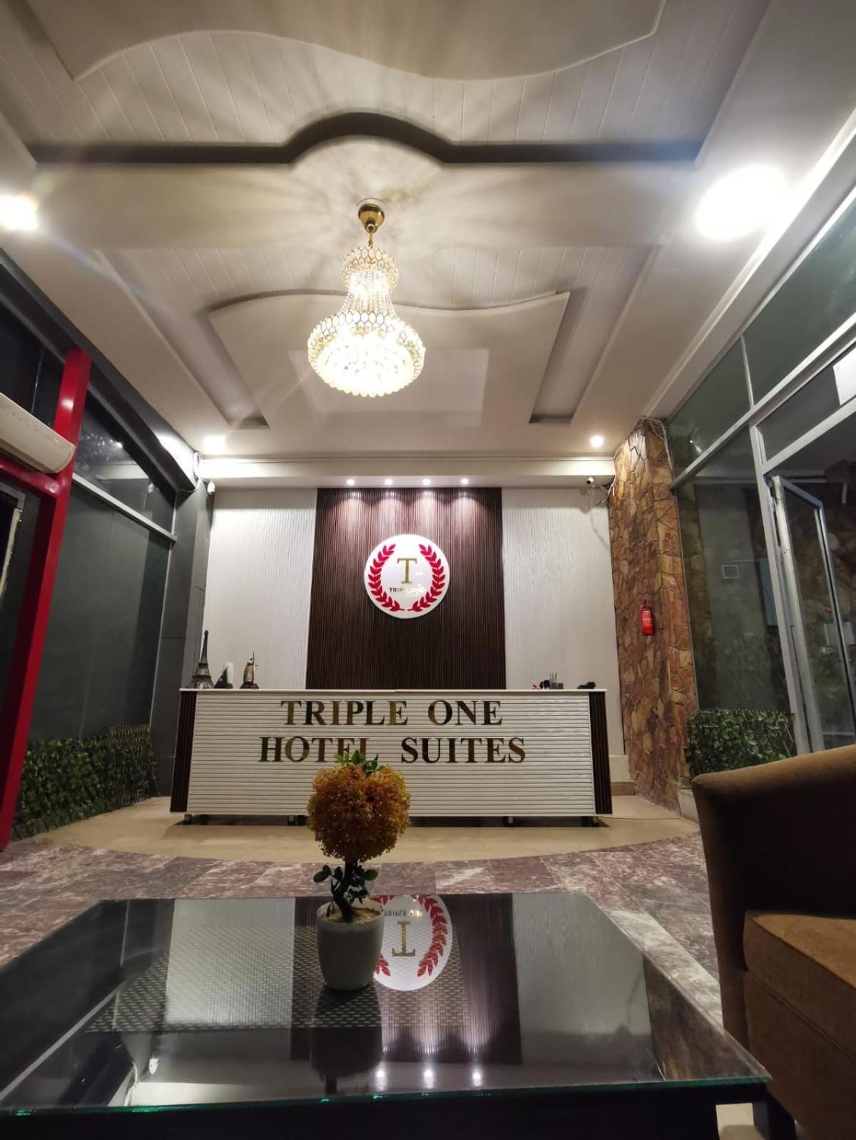 Triple One Hotel Suites Абботтабад Экстерьер фото