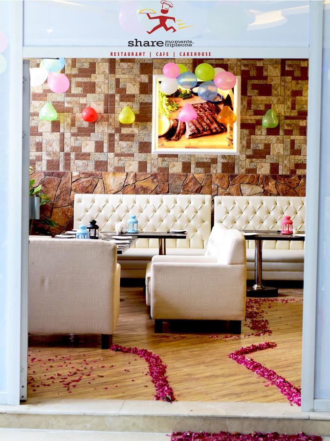 Triple One Hotel Suites Абботтабад Экстерьер фото