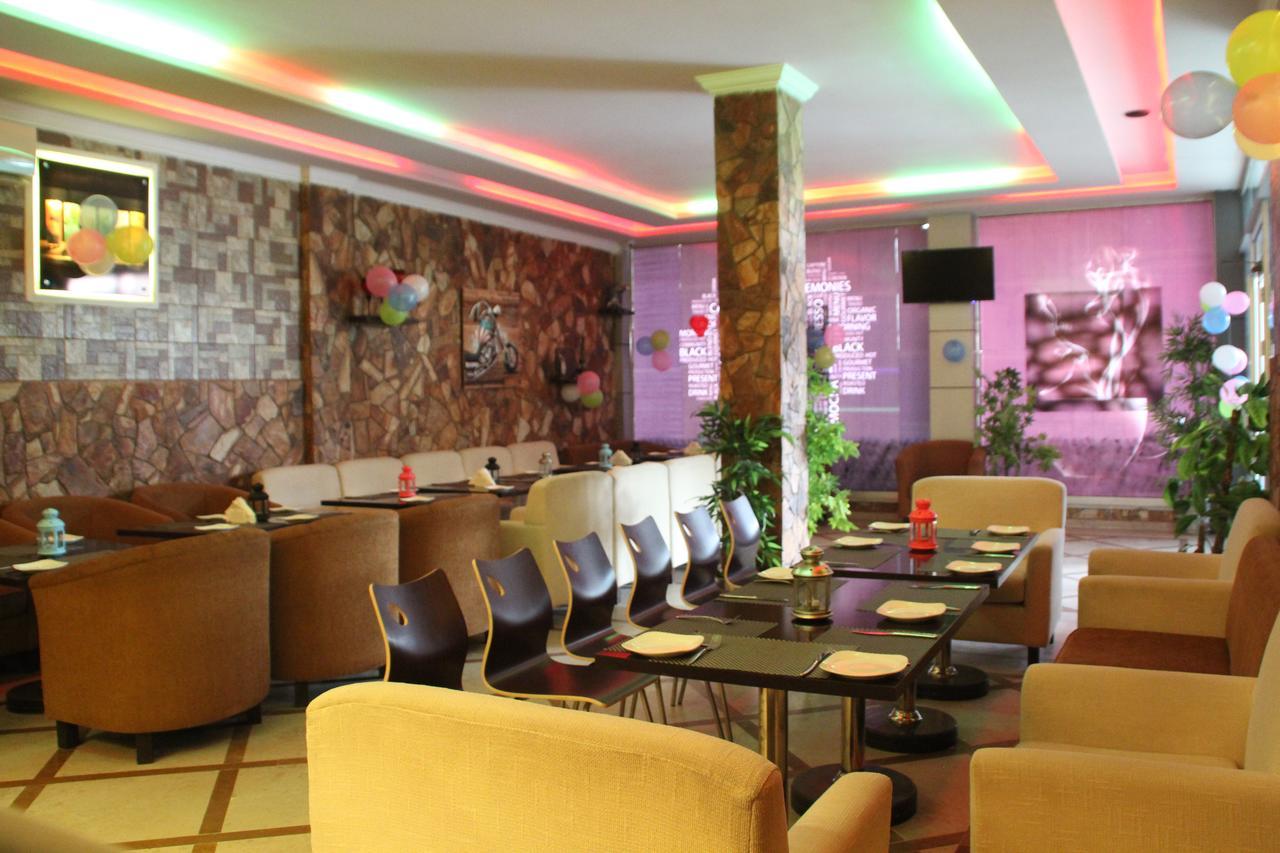 Triple One Hotel Suites Абботтабад Экстерьер фото