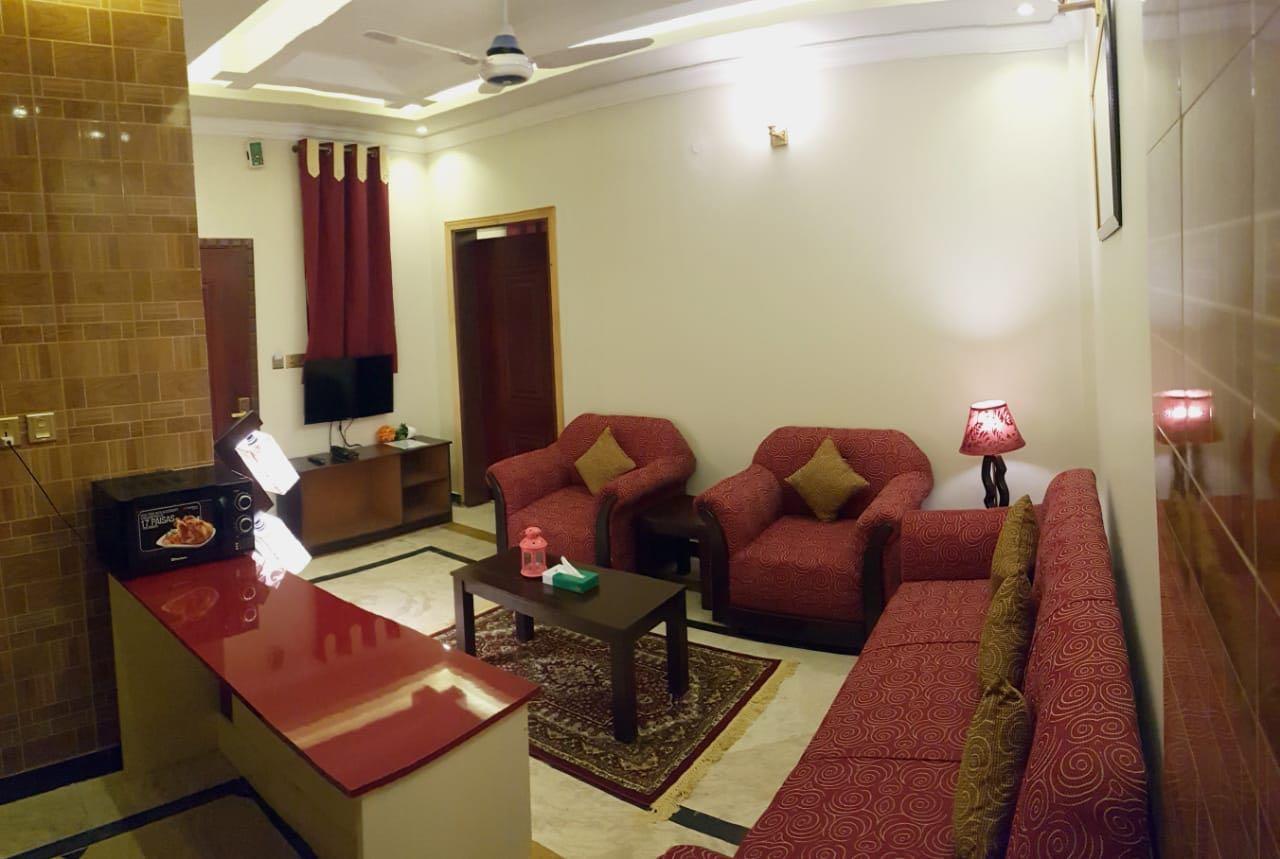 Triple One Hotel Suites Абботтабад Экстерьер фото
