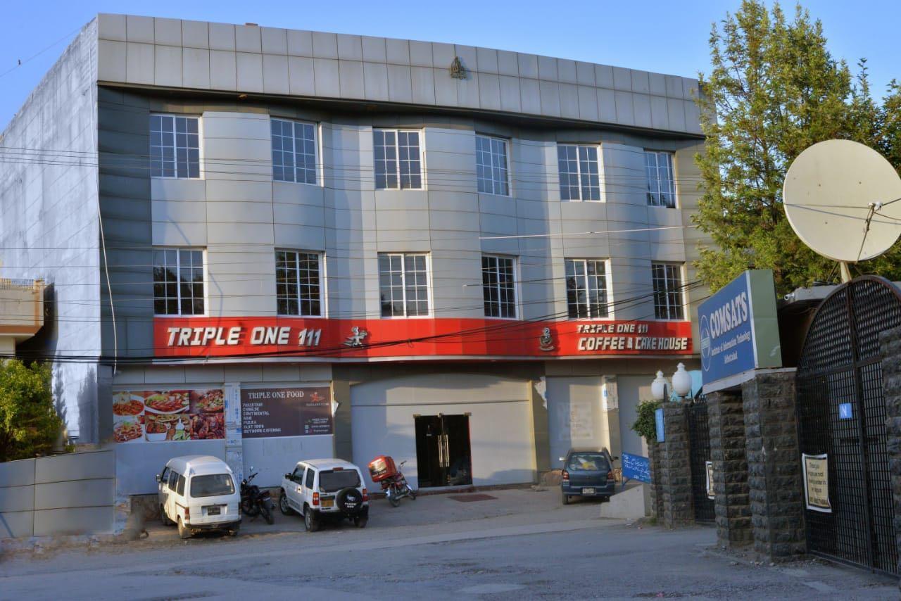 Triple One Hotel Suites Абботтабад Экстерьер фото